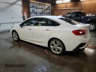 ✅ 2016 Chevrolet Cruze Premier • VIN: 1G1BG5SM7G7303885 • Lot: 72704042. Wystawiony na Copart z przebiegiem 103 198 mil. Bezpłatny archiwum sprzedaży aukcyjnych z USA i szczegółowy raport historii pojazdu na DreamBid. Zdjęcie 2.