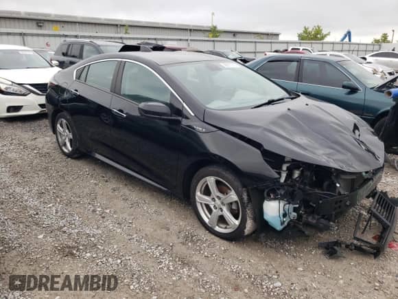 2016 Chevrolet Volt LT z VIN 1G1RA6S59GU101663, wystawiony jako Copart lot #59915713 z przebiegiem 128 084 mil mil oraz . Historia ofert i sprzedaży dostępna na DreamBid. Obrazek 4.