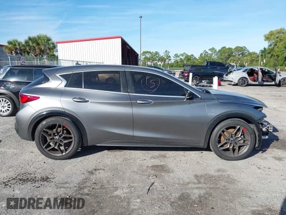 ✅ 2018 Infiniti QX30 Sport • VIN: SJKCH5CP3JA041999 • Lot: 43673206. Listed on IAAI with 81,003 mi. Free auction sales archive from the USA and detailed vehicle history report at DreamBid. Image 14.