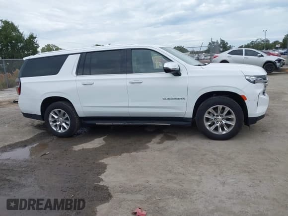 ✅ 2023 Chevrolet Suburban Premier • VIN: 1GNSCFKD1PR393037 • Lot: 43790048. Listed on IAAI with 70,824 mi. Free auction sales archive from the USA and detailed vehicle history report at DreamBid. Image 13.