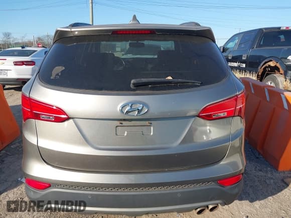 ✅ 2014 Hyundai Santa Fe • VIN: 5XYZW3LAXEG140795 • Лот: 43650491. Опубликован ранее на IAAI с пробегом 166 910 миль. Бесплатный доступ к архиву аукционных продаж из США и подробный отчёт об истории автомобиля на DreamBid. Изображение 16.