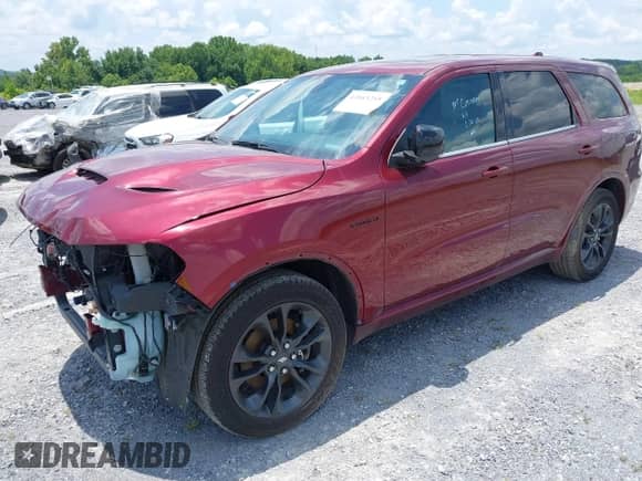 2021 Dodge Durango R/T with VIN 1C4SDJCT6MC848896, listed as a IAAI auction lot 41843255 with 59,234 mi miles and . Bid and sale history available at DreamBid. Image 2.