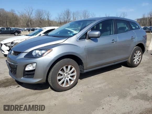 ✅ 2012 Mazda CX-7 i SV • VIN: JM3ER2AM2C0412683 • Lot: 53774075. Wystawiony na Copart z przebiegiem 196 344 mil. Bezpłatny archiwum sprzedaży aukcyjnych z USA i szczegółowy raport historii pojazdu na DreamBid. Zdjęcie 1.