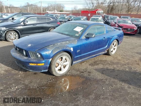 ✅ 2006 Ford Mustang GT Deluxe • VIN: 1ZVHT82H765141619 • Lot: 43901700. Listed on IAAI with 107,806 mi. Free auction sales archive from the USA and detailed vehicle history report at DreamBid. Image 2.