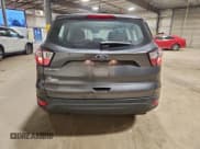 ✅ 2018 Ford Escape S • VIN: 1FMCU0F73JUB94261 • Lot: 95725975. Listed on Copart with 82,485 mi. Free auction sales archive from the USA and detailed vehicle history report at DreamBid. Image 6.