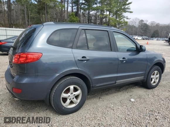 ✅ 2009 Hyundai Santa Fe GL • VIN: 5NMSG73E39H258613 • Lot: 49354215. Listed on Copart with 210,591 mi. Free auction sales archive from the USA and detailed vehicle history report at DreamBid. Image 3.