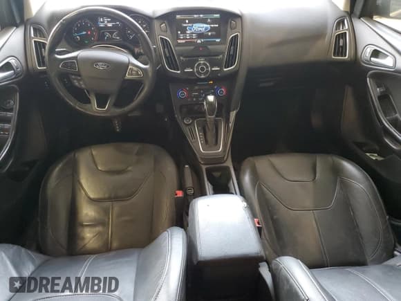 ✅ 2015 Ford Focus Titanium • VIN: 1FADP3J20FL231220 • Lot: 80630245. Listed on Copart with 143,805 mi. Free auction sales archive from the USA and detailed vehicle history report at DreamBid. Image 8.