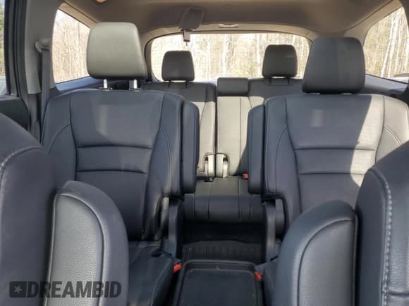 ✅ 2022 Honda Pilot Touring 7-Passenger • VIN: 5FNYF6H61NB504935 • Lot: 51186805. Listed on Copart with 99,373 mi. Free auction sales archive from the USA and detailed vehicle history report at DreamBid. Image 10.