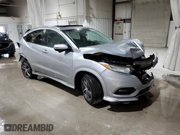 ✅ 2019 Honda HR-V Touring • VIN: 3CZRU6H94KM713897 • Лот: 70648005. Опубликован ранее на Copart с пробегом 94 754 миль. Бесплатный доступ к архиву аукционных продаж из США и подробный отчёт об истории автомобиля на DreamBid. Изображение 4.
