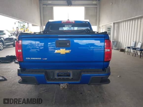 2018 Chevrolet Colorado 4WD Z71 z VIN 1GCGTDENXJ1155801, wystawiony jako IAAI lot #43394572 z przebiegiem 75 912 mil mil oraz . Historia ofert i sprzedaży dostępna na DreamBid. Obrazek 16.