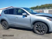 ✅ 2016 Mazda CX-5 Grand Touring • VIN: JM3KE4DY3G0609490 • Лот: 43417943. Опубликован ранее на IAAI с пробегом 243 145 миль. Бесплатный доступ к архиву аукционных продаж из США и подробный отчёт об истории автомобиля на DreamBid. Изображение 13.