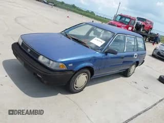 ✅ 1991 Toyota Corolla • VIN: JT2AE94K1M3424743 • Lot: 42969936. Listed on IAAI with 335,841 mi. Free auction sales archive from the USA and detailed vehicle history report at DreamBid. Image 2.