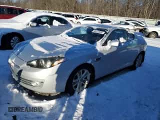 2007 Hyundai Tiburon GS z VIN KMHHM66D97U255247, wystawiony jako Copart lot #88322895 z przebiegiem 144 113 mil mil oraz Szkoda całkowita • Salvage title. Historia ofert i sprzedaży dostępna na DreamBid. Obrazek 1.