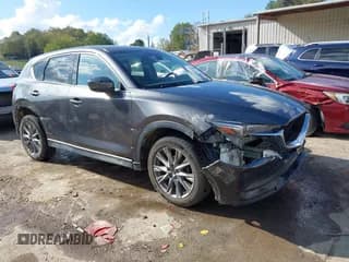 ✅ 2019 Mazda CX-5 Grand Touring • VIN: JM3KFBDM6K0570580 • Лот: 43283098. Опубликован ранее на IAAI с пробегом 260 949 миль. Бесплатный доступ к архиву аукционных продаж из США и подробный отчёт об истории автомобиля на DreamBid. Изображение 1.