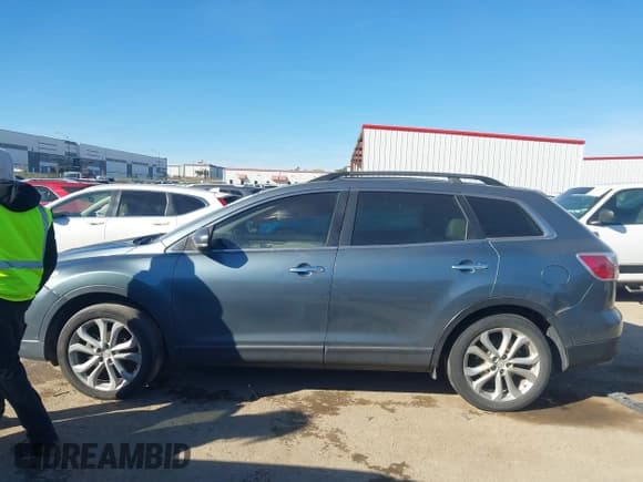 ✅ 2012 Mazda CX-9 Grand Touring • VIN: JM3TB2DA8C0358772 • Lot: 43656331. Listed on IAAI with 180,137 mi. Free auction sales archive from the USA and detailed vehicle history report at DreamBid. Image 14.