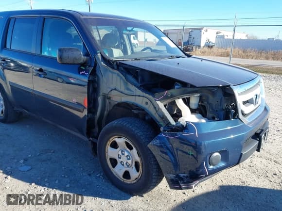 ✅ 2011 Honda Pilot LX • VIN: 5FNYF4H22BB013657 • Lot: 43686622. Listed on IAAI with 152,870 mi. Free auction sales archive from the USA and detailed vehicle history report at DreamBid. Image 6.