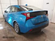 ✅ 2021 Toyota Prius L Eco • VIN: JTDKAMFU9M3135117 • Lot: 41579736. Listed on IAAI with 35,795 mi. Free auction sales archive from the USA and detailed vehicle history report at DreamBid. Image 3.