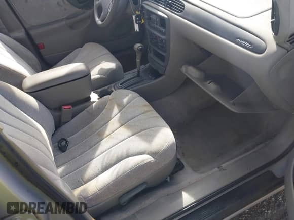 1998 Chevrolet Malibu z VIN 1G1ND52M0W6202102, wystawiony jako IAAI lot #41416675 z przebiegiem 67 508 mil mil oraz . Historia ofert i sprzedaży dostępna na DreamBid. Obrazek 5.