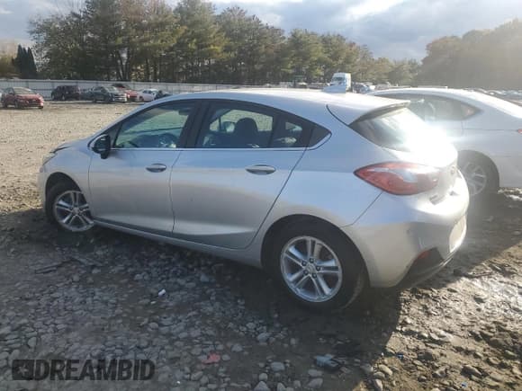 ✅ 2018 Chevrolet Cruze LT • VIN: 3G1BE6SMXJS521761 • Лот: 86512265. Опубликован ранее на Copart с пробегом 48 323 миль. Бесплатный доступ к архиву аукционных продаж из США и подробный отчёт об истории автомобиля на DreamBid. Изображение 2.