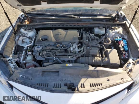 2020 Toyota Camry Hybrid LE с VIN 4T1E31AK6LU014142, выставлен на аукционе Copart как лот 82250985 с пробегом 90 637 миль миль и Списание • Salvage title. История ставок и продаж доступна на DreamBid. Изображение 11.