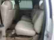 2005 Chevrolet Suburban LT z VIN 1GNEC16Z45J233283, wystawiony jako Copart lot #73947954 z przebiegiem Nie podano mil oraz Szkoda całkowita • Salvage title. Historia ofert i sprzedaży dostępna na DreamBid. Obrazek 11.