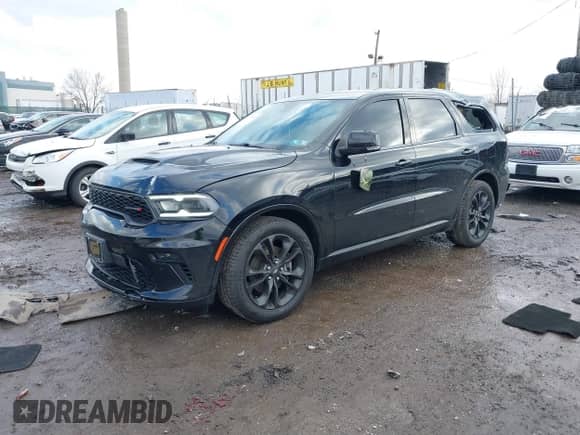 2021 Dodge Durango R/T with VIN 1C4SDJCT2MC837619, listed as a IAAI auction lot 41579641 with 49,603 mi miles and . Bid and sale history available at DreamBid. Image 2.