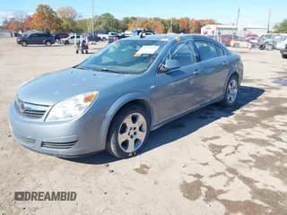 ✅ 2009 Saturn Aura XE • VIN: 1G8ZS57BX9F168416 • Лот: 43562826. Опубликован ранее на IAAI с пробегом 144 846 миль. Бесплатный доступ к архиву аукционных продаж из США и подробный отчёт об истории автомобиля на DreamBid. Изображение 2.