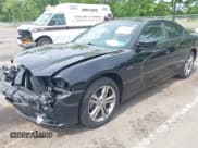 ✅ 2013 Dodge Charger RT Plus • VIN: 2C3CDXDT3DH584611 • Lot: 42434626. Listed on IAAI with 154,201 mi. Free auction sales archive from the USA and detailed vehicle history report at DreamBid. Image 2.