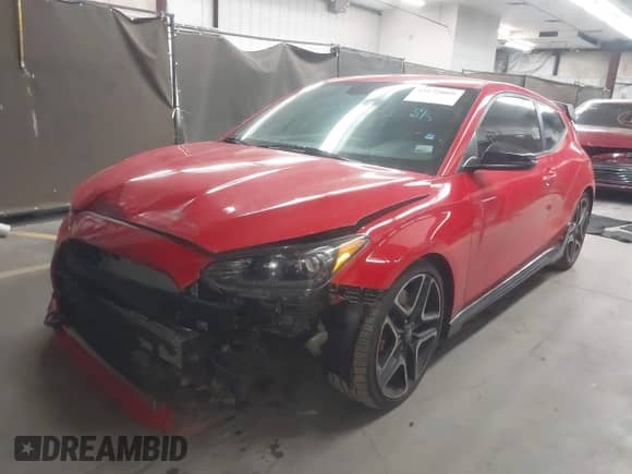 2020 Hyundai Veloster z VIN KMHT36AH6LU004297, wystawiony jako IAAI lot #42175069 z przebiegiem 88 955 mil mil oraz . Historia ofert i sprzedaży dostępna na DreamBid. Obrazek 2.