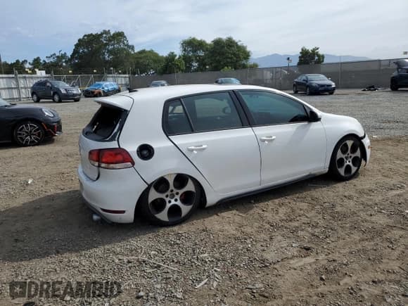 ✅ 2012 Volkswagen Golf GTI PZEV • VIN: WVWGD7AJ7CW323742 • Lot: 70830135. Listed on Copart with 140,949 mi. Free auction sales archive from the USA and detailed vehicle history report at DreamBid. Image 3.