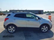 ✅ 2015 Buick Encore Premium • VIN: KL4CJHSB4FB100746 • Lot: 42916410. Wystawiony na IAAI z przebiegiem 169 060 mil. Bezpłatny archiwum sprzedaży aukcyjnych z USA i szczegółowy raport historii pojazdu na DreamBid. Zdjęcie 13.