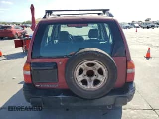 ✅ 2001 Chevrolet Tracker • VIN: 2CNBE13C816917150 • Лот: 77093144. Опубликован ранее на Copart с пробегом Не указан. Бесплатный доступ к архиву аукционных продаж из США и подробный отчёт об истории автомобиля на DreamBid. Изображение 6.