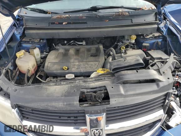 2010 Dodge Journey SE with VIN 3D4PG4FB6AT198651, listed as a Copart auction lot 90991705 with 102,501 mi miles and Clean title. Bid and sale history available at DreamBid. Image 11.