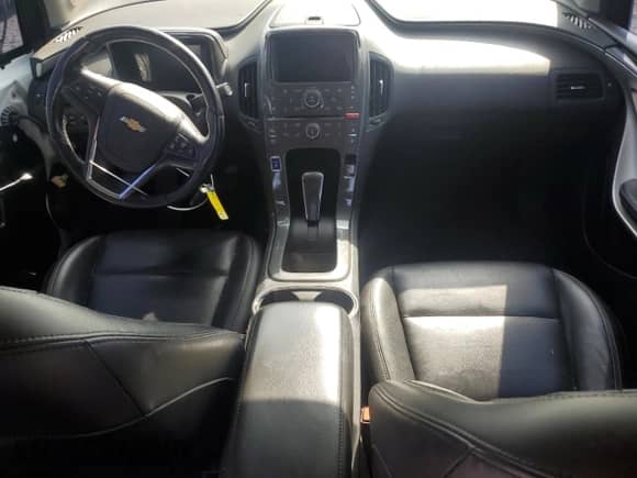 2015 Chevrolet Volt z VIN 1G1RD6E45FU142722, wystawiony jako Copart lot #54075214 z przebiegiem 227 289 mil mil oraz . Historia ofert i sprzedaży dostępna na DreamBid. Obrazek 8.