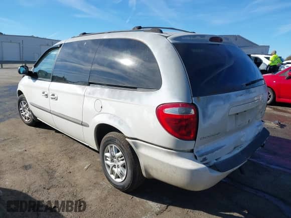 2002 Dodge Caravan eL z VIN 1B4GP34332B579781, wystawiony jako IAAI lot #40827810 z przebiegiem 221 891 mil mil oraz . Historia ofert i sprzedaży dostępna na DreamBid. Obrazek 3.