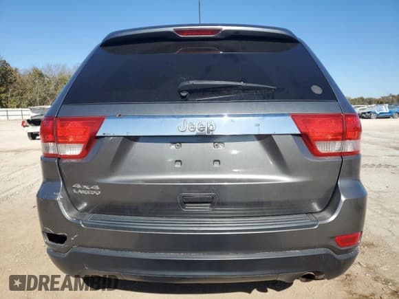 ✅ 2012 Jeep Grand Cherokee Laredo • VIN: 1C4RJFAG3CC304963 • Лот: 92463385. Опубликован ранее на Copart с пробегом 140 356 миль. Бесплатный доступ к архиву аукционных продаж из США и подробный отчёт об истории автомобиля на DreamBid. Изображение 6.