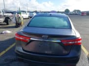 ✅ 2014 Toyota Avalon XLE Touring • VIN: 4T1BK1EB9EU124928 • Lot: 43719540. Listed on IAAI with 113,039 mi. Free auction sales archive from the USA and detailed vehicle history report at DreamBid. Image 16.