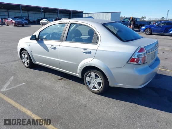 2007 Chevrolet Aveo LS z VIN KL1TD56657B150282, wystawiony jako IAAI lot #41416393 z przebiegiem 74 809 mil mil oraz . Historia ofert i sprzedaży dostępna na DreamBid. Obrazek 3.