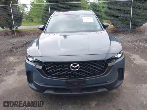 ✅ 2023 Mazda CX-50 S Premium Plus • VIN: 7MMVABEM6PN105424 • Lot: 42148825. Wystawiony na IAAI z przebiegiem 40 434 mil. Bezpłatny archiwum sprzedaży aukcyjnych z USA i szczegółowy raport historii pojazdu na DreamBid. Zdjęcie 13.