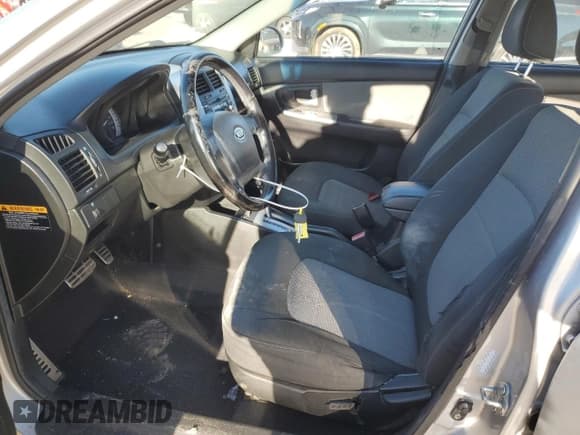 ✅ 2007 Kia Spectra • VIN: KNAFE161375004104 • Lot: 87377124. Listed on Copart with 241,076 mi. Free auction sales archive from the USA and detailed vehicle history report at DreamBid. Image 7.