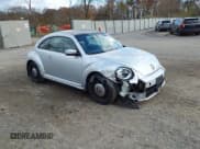 ✅ 2012 Volkswagen Beetle 2.5L PZEV • VIN: 3VWJP7AT2CM636502 • Lot: 43692083. Listed on IAAI with 103,082 mi. Free auction sales archive from the USA and detailed vehicle history report at DreamBid. Image 1.