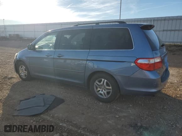 ✅ 2006 Honda Odyssey EX-L • VIN: 5FNRL38746B123750 • Лот: 90249165. Опубликован ранее на Copart с пробегом 264 175 миль. Бесплатный доступ к архиву аукционных продаж из США и подробный отчёт об истории автомобиля на DreamBid. Изображение 2.