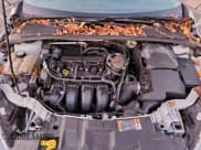 ✅ 2015 Ford Focus SE • VIN: 1FADP3F27FL365134 • Lot: 95317315. Wystawiony na Copart z przebiegiem 200 473 mil. Bezpłatny archiwum sprzedaży aukcyjnych z USA i szczegółowy raport historii pojazdu na DreamBid. Zdjęcie 11.