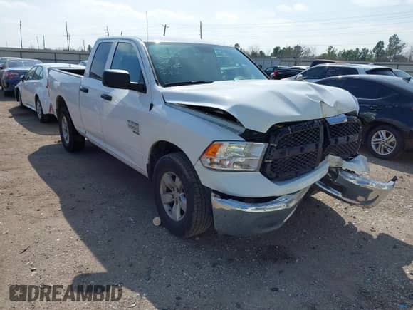 2024 Ram 1500 SLT with VIN 1C6RR6GG3RS128728, listed as a IAAI auction lot 41598041 with 24,872 mi miles and . Bid and sale history available at DreamBid. Image 1.