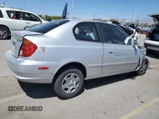 2005 Hyundai Accent GLS с VIN KMHCG35C05U323148, выставлен на аукционе Copart как лот 54077465 с пробегом 59 182 миль миль и Списание • Salvage title. История ставок и продаж доступна на DreamBid. Изображение 3.