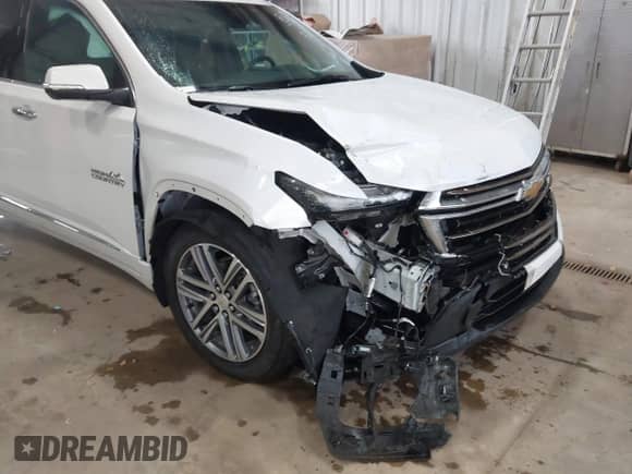 2022 Chevrolet Traverse High Country z VIN 1GNEVNKW6NJ181569, wystawiony jako IAAI lot #43291682 z przebiegiem 25 120 mil mil oraz . Historia ofert i sprzedaży dostępna na DreamBid. Obrazek 6.