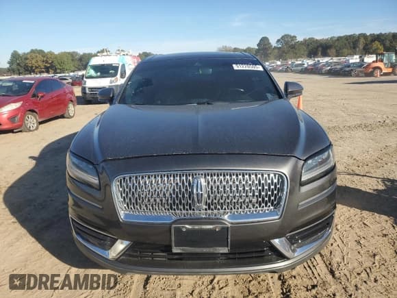 ✅ 2019 Lincoln Nautilus Select • VIN: 2LMPJ8K99KBL17590 • Lot: 91220505. Listed on Copart with 140,492 mi. Free auction sales archive from the USA and detailed vehicle history report at DreamBid. Image 5.