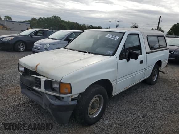 ✅ 1990 Isuzu Pickup S • VIN: JAACL11L3L7222277 • Lot: 71275805. Listed on Copart with 154,198 mi. Free auction sales archive from the USA and detailed vehicle history report at DreamBid. Image 1.