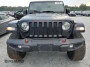 ✅ 2023 Jeep Wrangler Rubicon • VIN: 1C4HJXFN3PW618061 • Lot: 71963815. Listed on Copart with 25,881 mi. Free auction sales archive from the USA and detailed vehicle history report at DreamBid. Image 5.