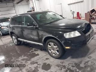 ✅ 2004 Volkswagen Touareg • VIN: WVGCM77L64D073815 • Lot: 41615223. Wystawiony na IAAI z przebiegiem 140 090 mil. Bezpłatny archiwum sprzedaży aukcyjnych z USA i szczegółowy raport historii pojazdu na DreamBid. Zdjęcie 1.